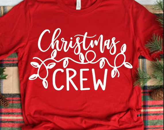Christmas Crew printed on a red t-shirt made with Cricut