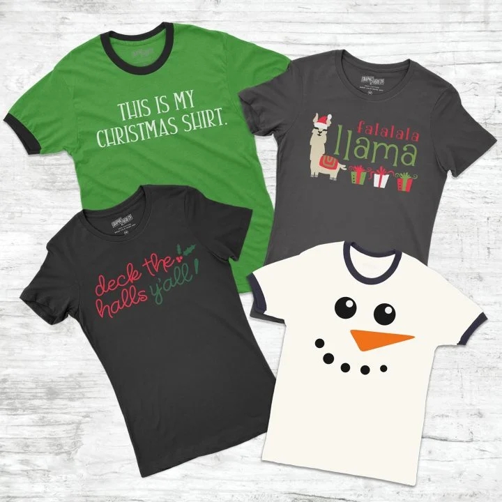 Four different colored shirts made with a Cricut cutting machine for the Christmas festival.