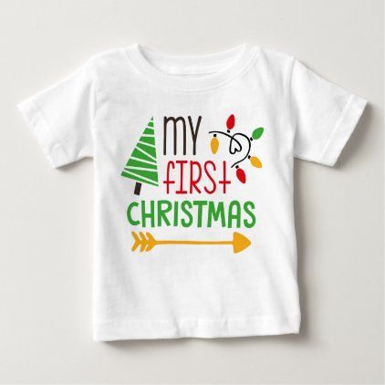 A white t-shirt with "My First Christmas" printed in red and green color.